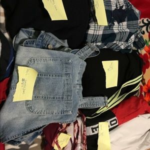 Sweaters. Pants that are overalls. Shirts